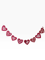 Paper Party Studio red heart bunting with floral cut-outs and 'Love' script, perfect for Valentine's Day.