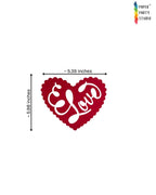 Paper Party Studio red heart bunting piece with scalloped edges and intricate Love cursive cut-out design.