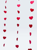 Paper Party Studio red heart garland, set of 10 strings with mini heart cut-outs, perfect for Valentine's Day or weddings.