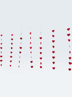 Paper Party Studio red heart garland, 10 strings of mini red hearts on white thread, romantic backdrop decoration.