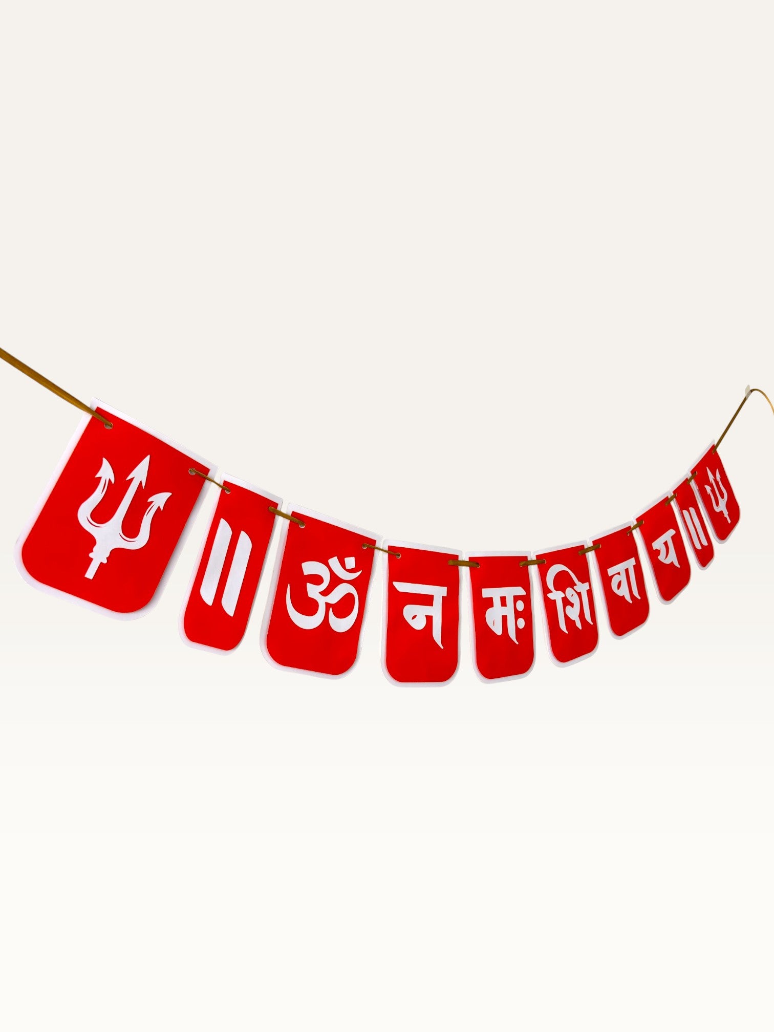 Paper Party Studio red paper banner featuring white Om Namah Shivaya mantra and trishul motifs for pooja decoration.