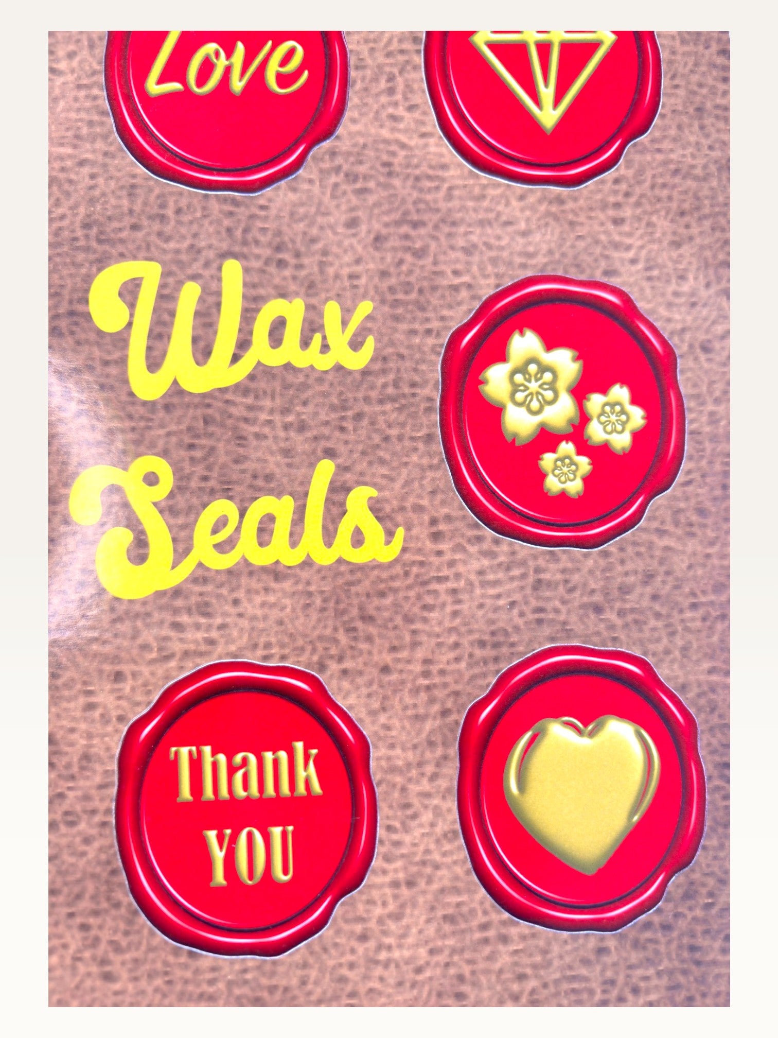 Paper Party Studio wax seal sticker sheet featuring red glossy vintage-style seals with gold love, floral, and text motifs