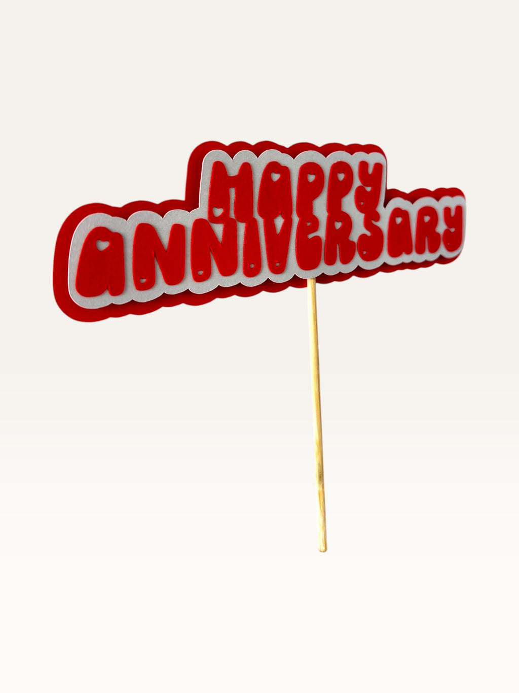 Paper Party Studio handmade red and white layered paper Happy Anniversary cake topper with heart cut-out details.