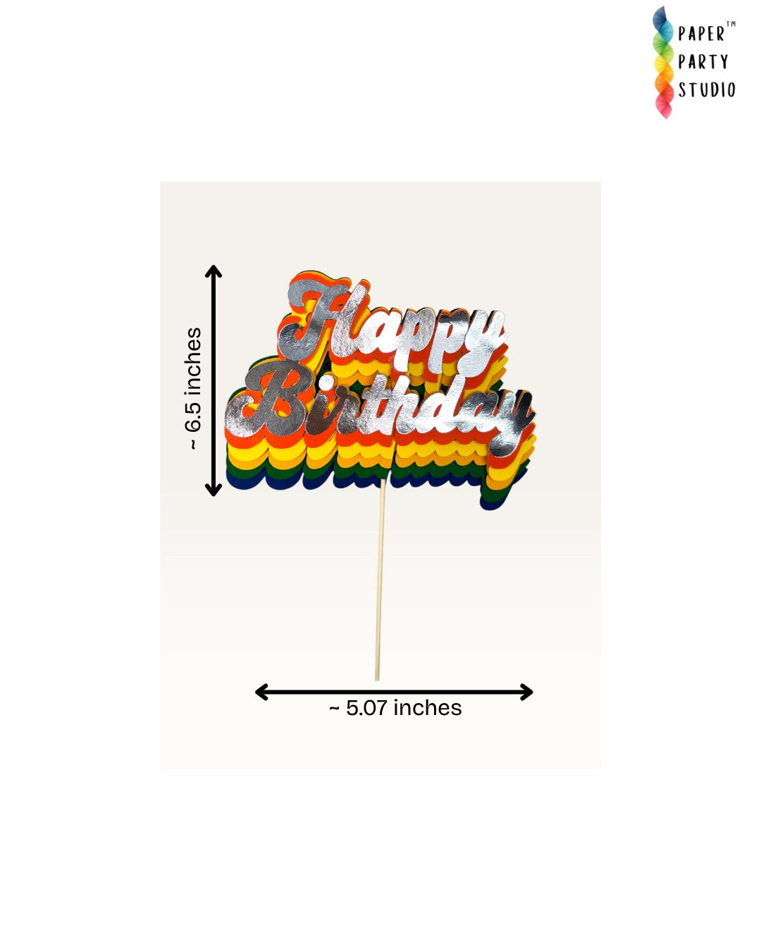 Paper Party Studio retro rainbow Happy Birthday cake topper with silver layered script lettering on a slim stick.