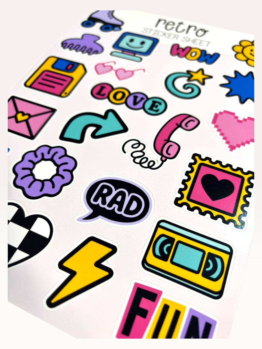 Paper Party Studio retro sticker sheet featuring colourful 90s nostalgia icons like a VHS tape, scrunchie, and heart.