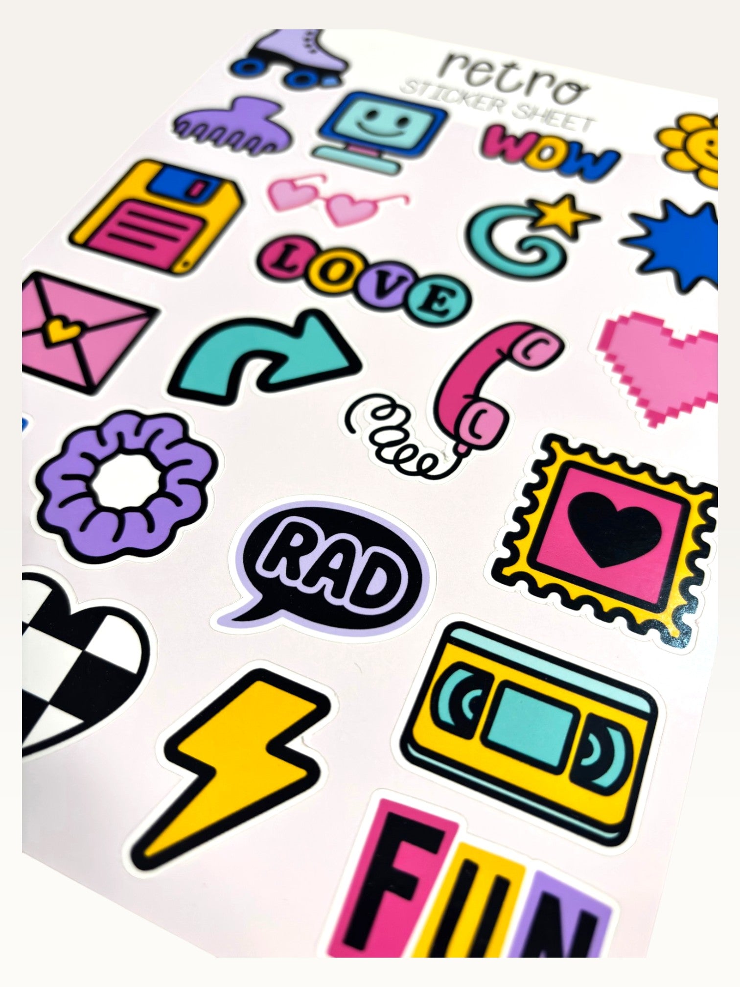 Paper Party Studio retro sticker sheet featuring colourful 90s icons like roller skates, floppy disks, and scrunchies.