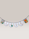 Paper Party Studio safari birthday banner with white scalloped flags spelling "FOUR", featuring a giraffe and tiger with tropical leaves.