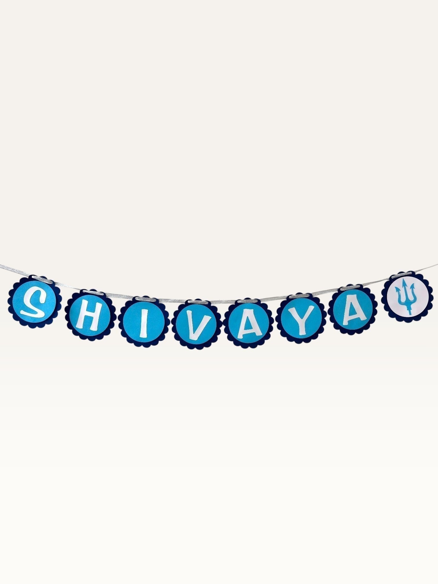 Paper Party Studio blue Om Namah Shivaya bunting with scalloped cardstock medallions and trishul accents for pooja.