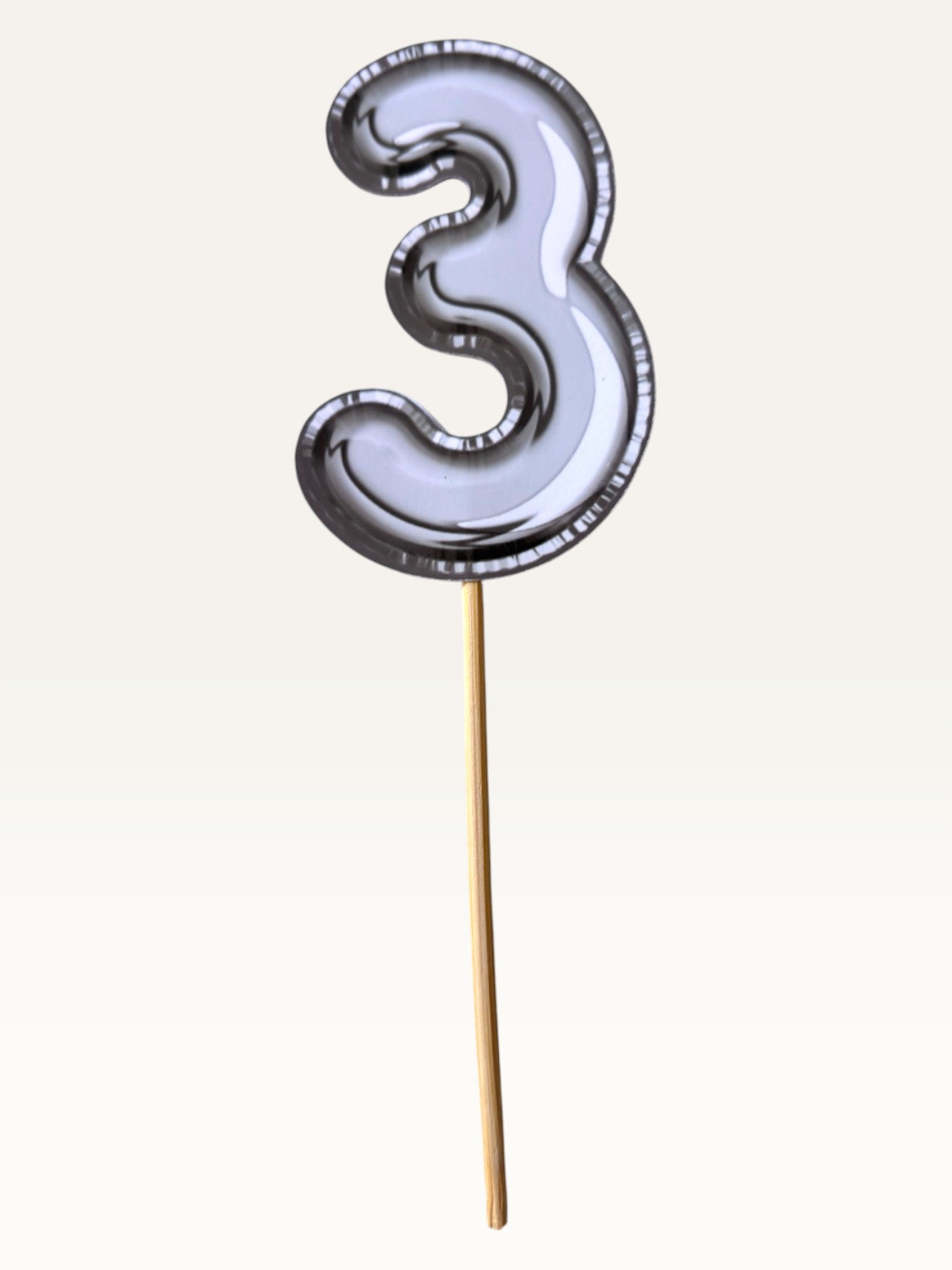 Paper Party Studio silver foil number 3 cupcake topper on a bamboo stick made from premium thick paper