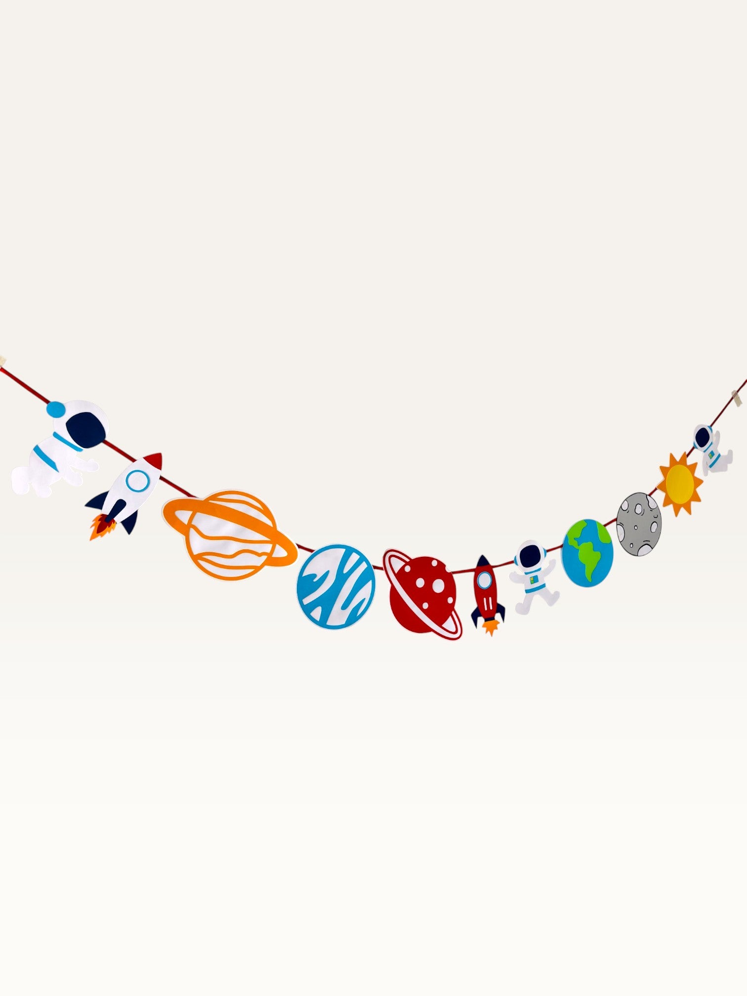 Paper Party Studio space adventure garland featuring colorful paper astronauts, rockets, and planets on a hanging cord.