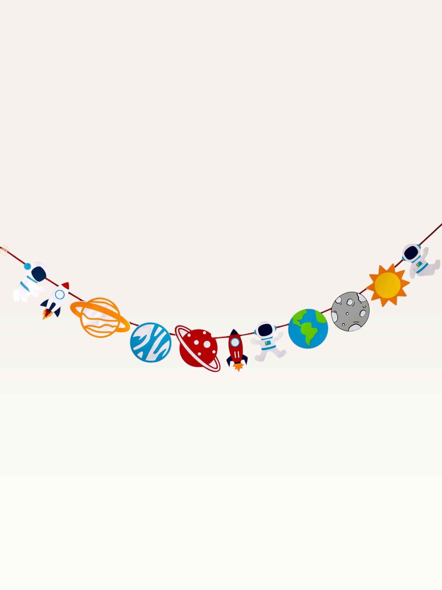 Paper Party Studio space adventure garland featuring colorful paper astronauts, rockets, and planets on a string.