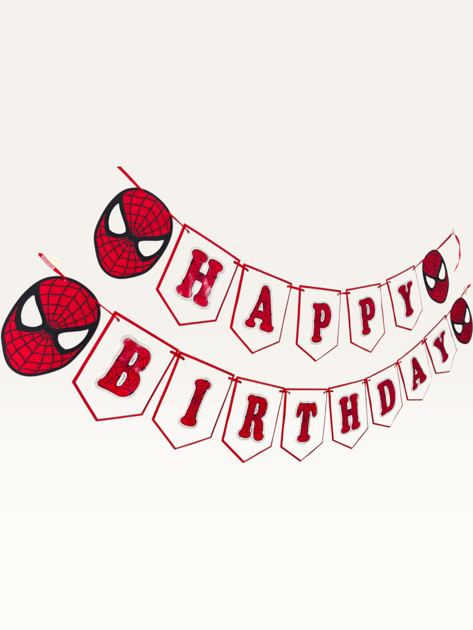 Paper Party Studio red and white Happy Birthday banner with black spider-web patterns and hero face medallions.