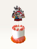 Paper Party Studio personalised Stranger Things themed cake topper featuring character cutouts on a small cake.