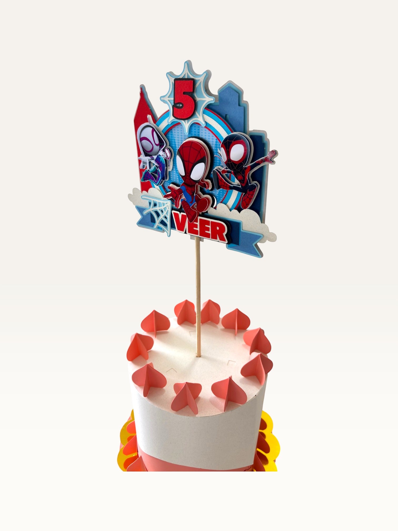 Paper Party Studio personalised superhero cake topper with comic city skyline, masked heroes, and age number 5.