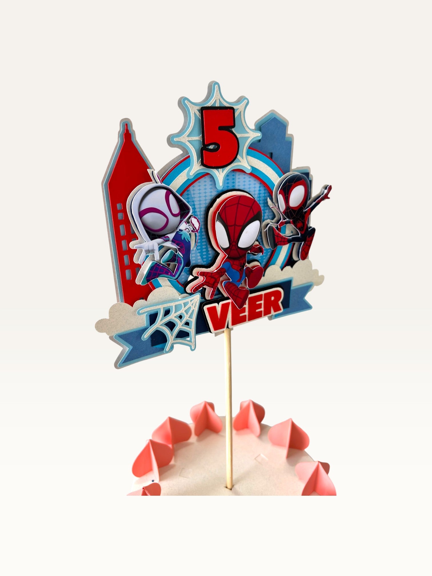 Paper Party Studio personalised superhero cake topper with comic city skyline, masked heroes, and age 5 banner.