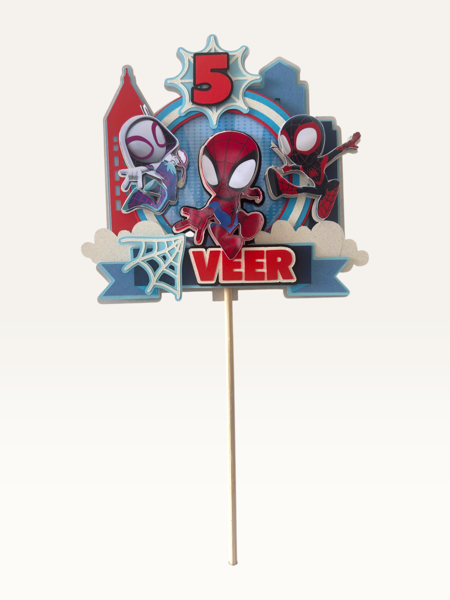 Paper Party Studio personalised superhero city cake topper with masked heroes and comic skyline
