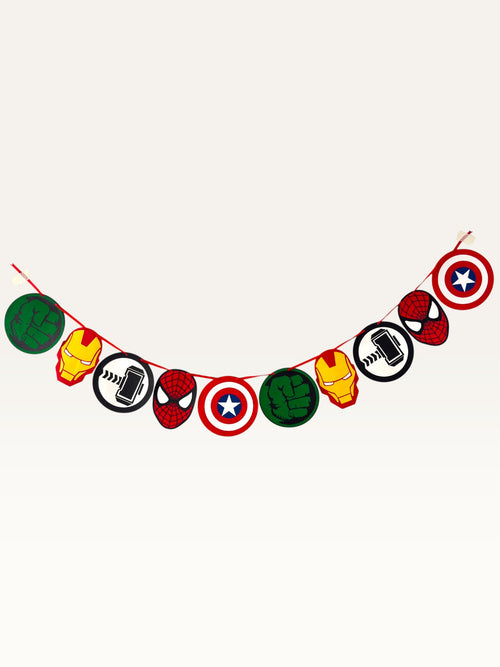 Paper Party Studio superhero emblem garland featuring comic book character icons in red, blue, green, and gold.