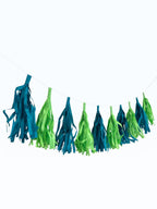 Paper Party Studio blue and green tissue paper tassel garland for party decorations and photo backdrops.