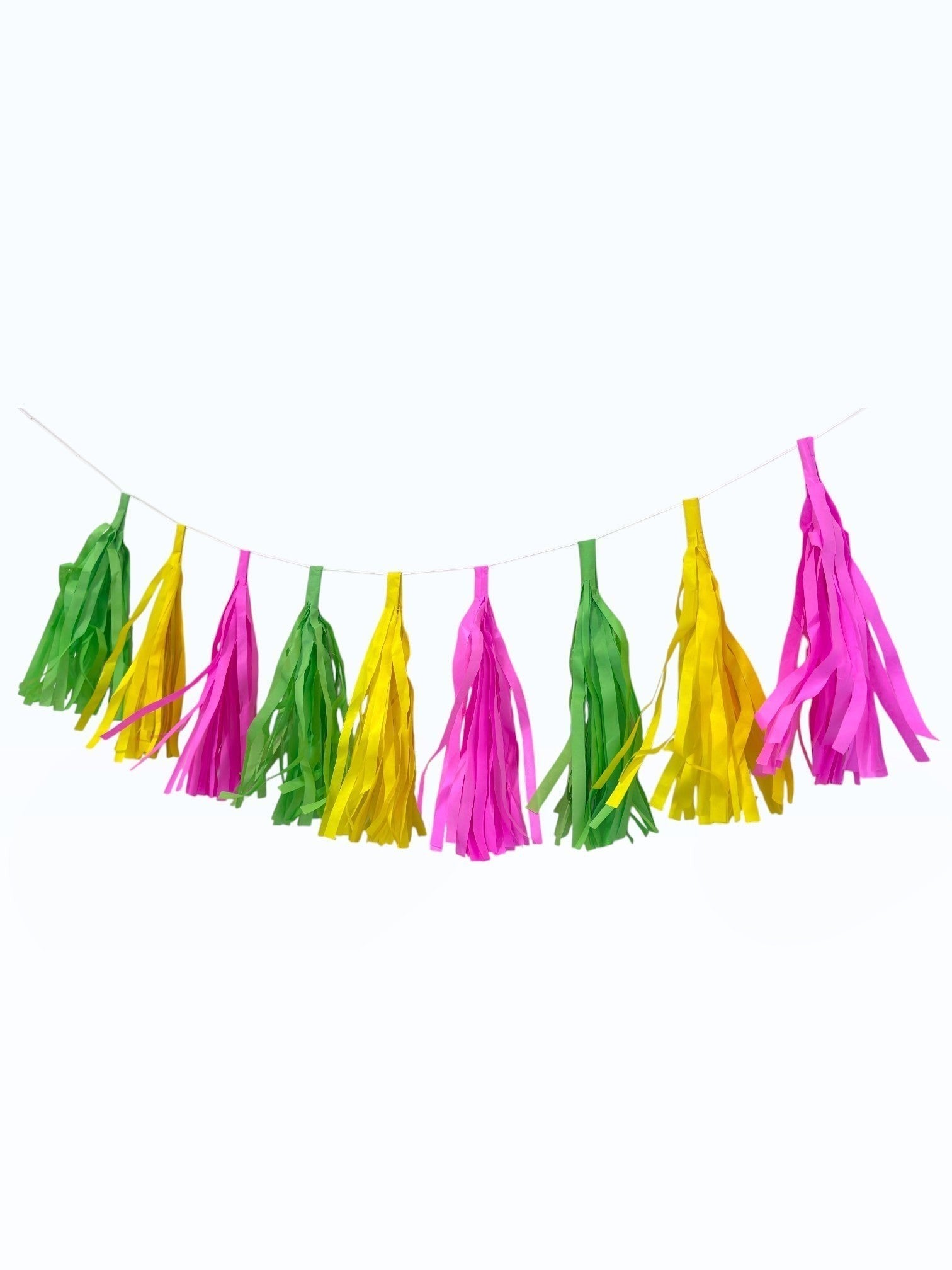 Paper Party Studio handmade tissue paper tassel garland in vibrant pink, yellow, and green for party decorations.