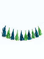 Paper Party Studio paper tassel garland in teal and green for jungle safari themed birthday party decorations