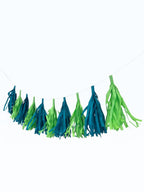 Paper Party Studio handmade tissue paper tassel garland in alternating shades of teal and bright green on a cord.