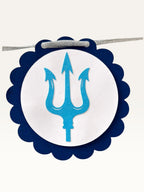 Paper Party Studio blue and white scalloped paper garland featuring a trishul symbol for Shivratri home decor.