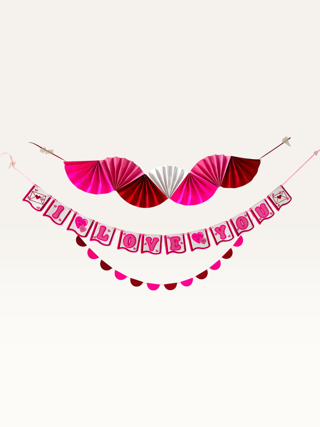 Paper Party Studio Valentine's decoration set featuring a pink, red, and white fan, I Love You banner, and garland.