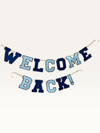 Paper Party Studio Welcome Back banner featuring navy and sky blue varsity letters strung on a gold cord.