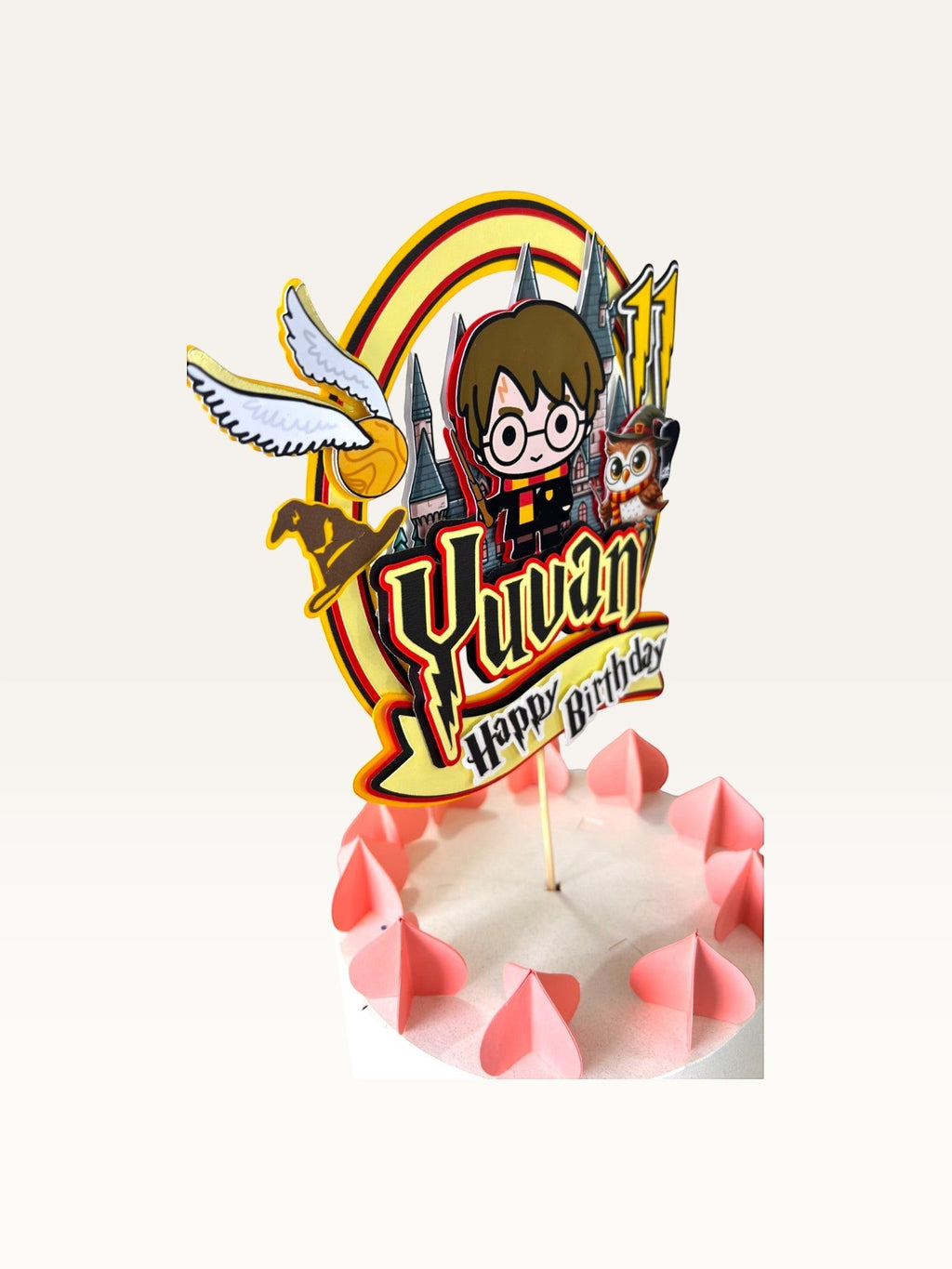 Paper Party Studio personalised wizard school cake topper featuring a young wizard, owl, and castle in red and gold.