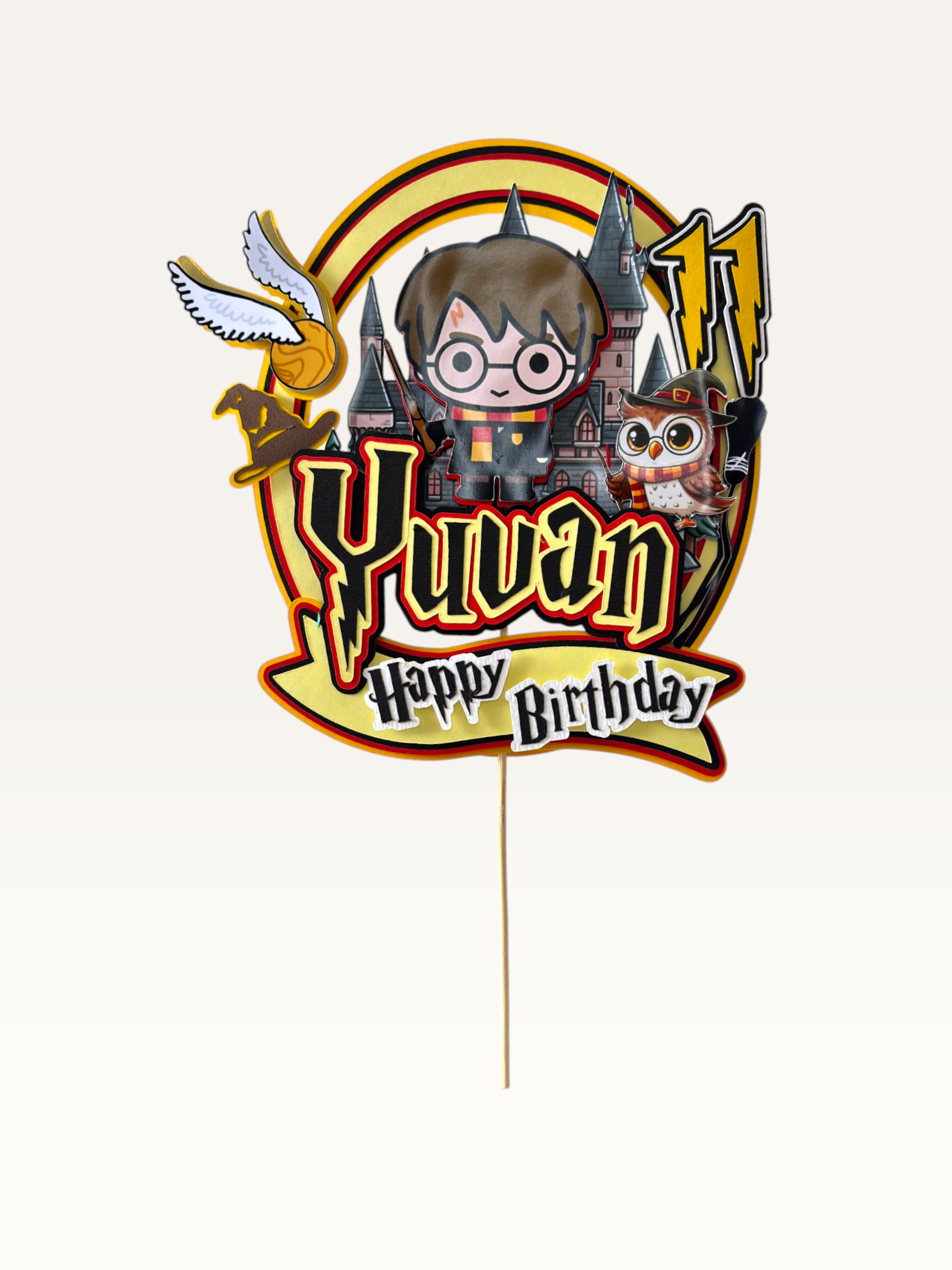 Paper Party Studio wizard school cake topper with castle owl and young wizard character