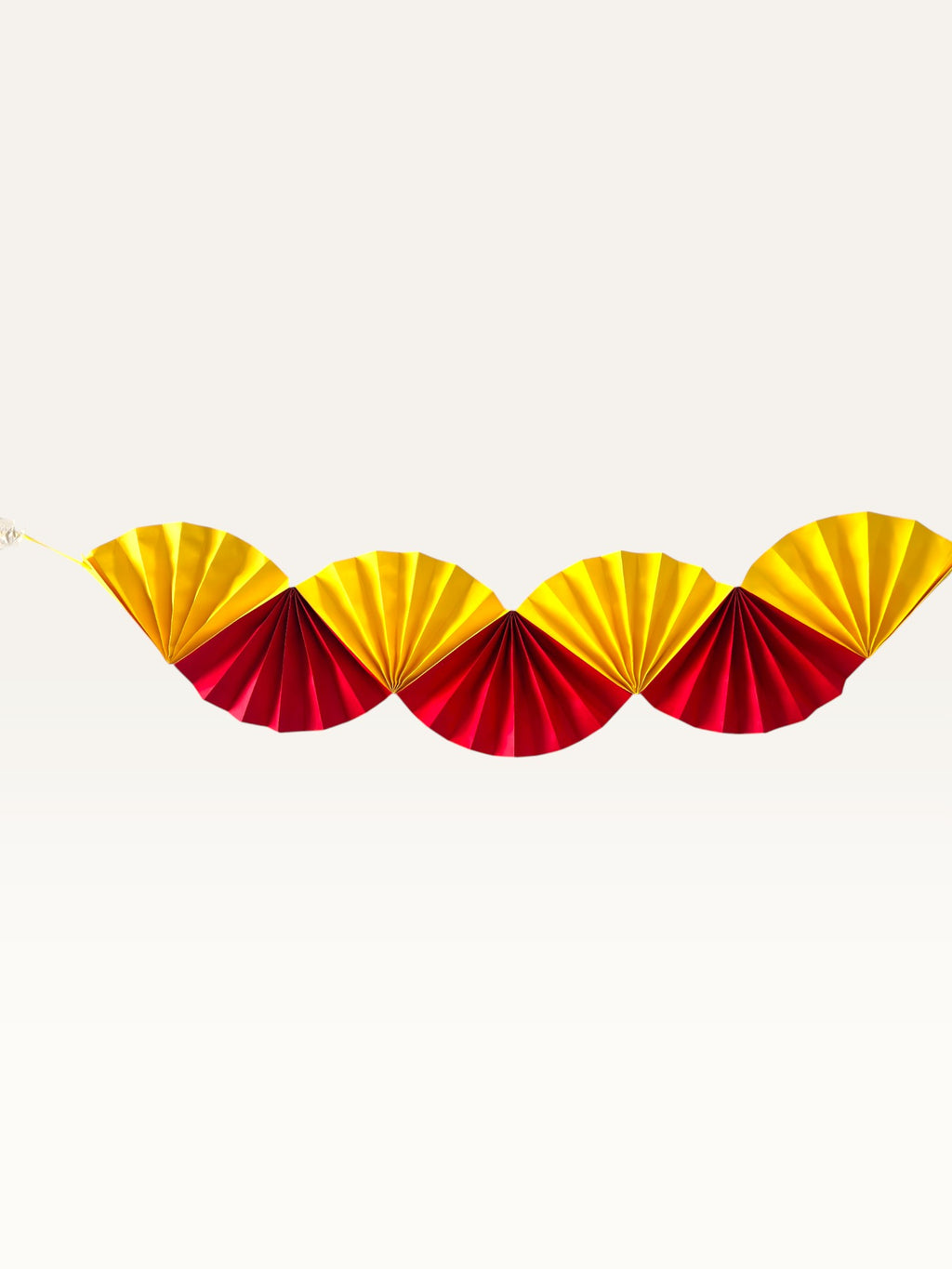 Paper Party Studio yellow and red paper folding-fan garland for Diwali and pooja festive decoration