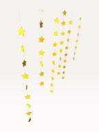Paper Party Studio set of 10 yellow paper star garland strings for hanging party decorations and backdrops